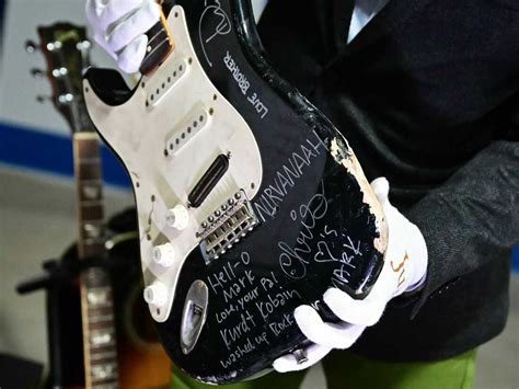 Kurt Cobain's broken guitar sells for nearly $600,000 : NPR