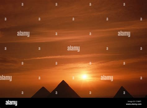 Egypt, Cairo, Giza, pyramids seen in sunrise Stock Photo - Alamy