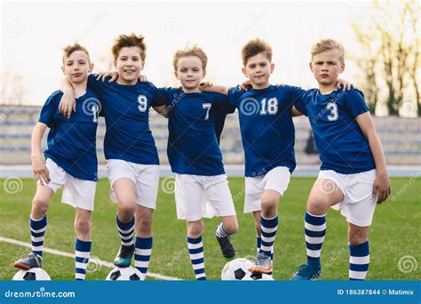 Young Boys in Soccer Team. Happy Junior Sports Group of Kids Stock ...