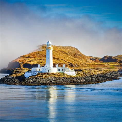 The picturesque Lismore Lighthouse on Lismore Island can be seen from ...