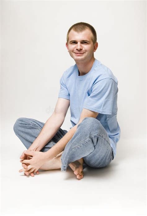 Man sitting cross legged stock photo. Image of casually - 5391916