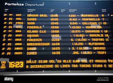 Train timetable in the Turin railway station in Italy Stock Photo - Alamy