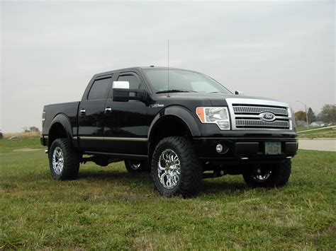 show your pictures Black or chrome and black rims on black truck ...