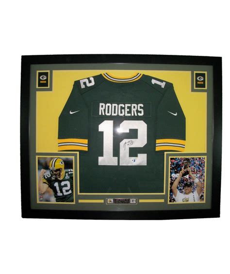 √ Autographed Aaron Rodgers Football