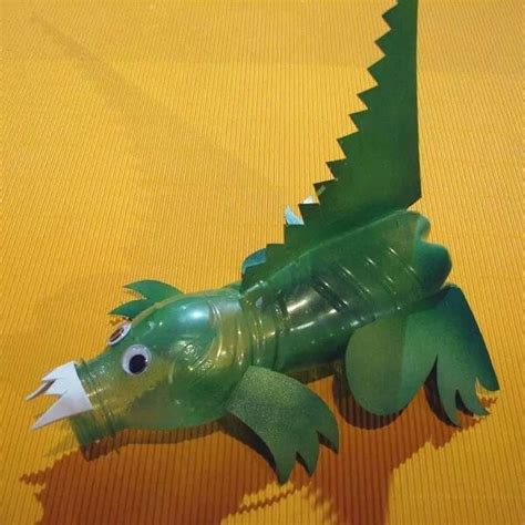 Dragon from plastic bottles | Dragon crafts, Dinosaur crafts, Soda ...