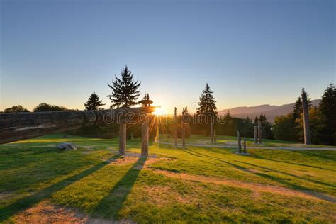 Burnaby Mountain Totem Poles at Sunrise Stock Image - Image of ...