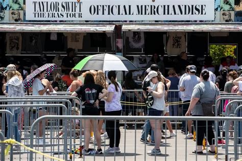 Taylor Swift tour merch seekers stand in line for concert gear