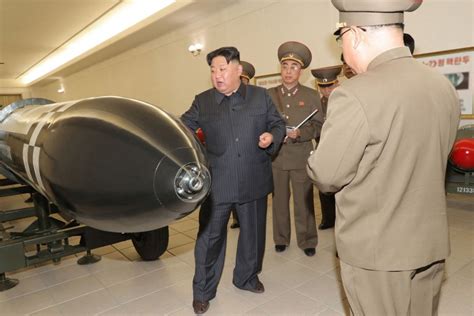 North Korea unveils new nuclear warheads as U.S. air carrier arrives in ...