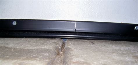 INSTALLING GARAGE DOOR BOTTOM SEAL KITS - Garage Door Weather Seal