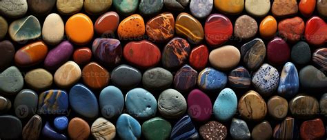 A spectrum of colorful rocks or pebbles background, seen from a close ...