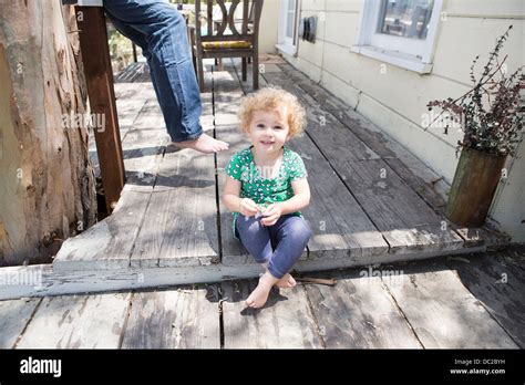 Child sitting cross legged Stock Photo - Alamy