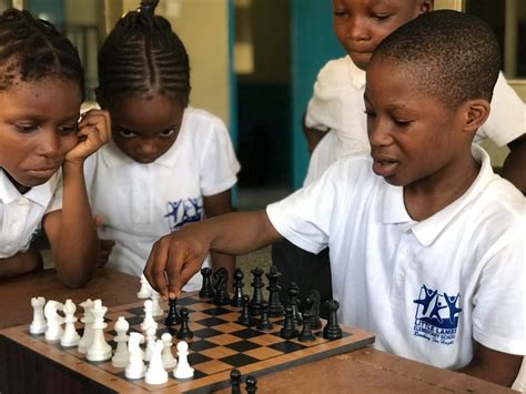 Black Children Playing Chess · Free Stock Photo