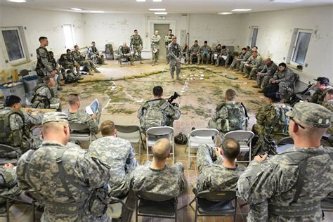 U.S. soldiers and paratroopers conduct a pre-mission brief for an air ...