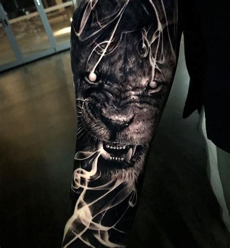 Incredible black and grey realism lion tattoo by @da_ink. #STYNG - You ...