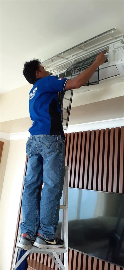 Cleaning service in high place of a condominium in Manila City ...