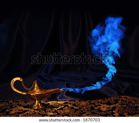 Magic Aladdin Genie Lamp With Blue Smoke, But No Genie Face Stock Photo ...