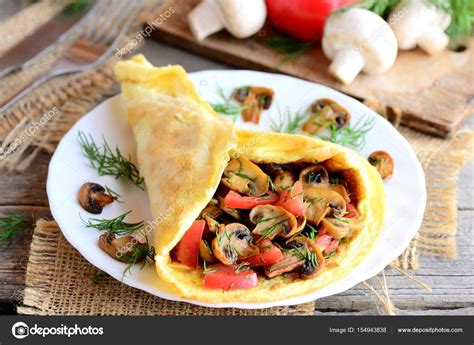 Vegetarian omelette recipe. Mushrooms omelette with tomatoes and dill ...