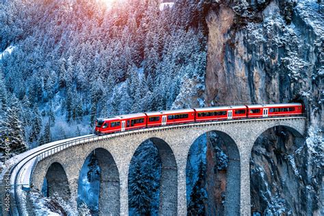 Aerial view of Train passing through famous mountain in Filisur ...