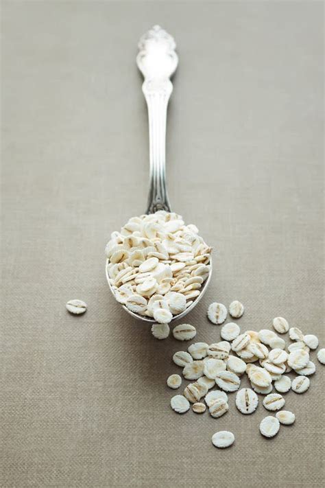 Organic Barley Flakes stock image. Image of uncooked - 48981187