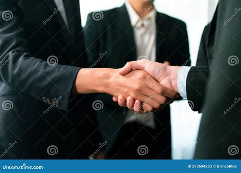 Asian Business People Shake Hand after Made Successful Deal. Quaint ...