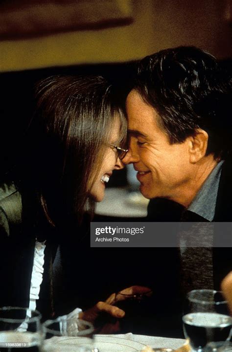 Diane Keaton shares a tender moment with Warren Beatty in a scene ...