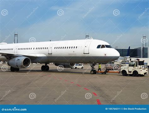 TUG Pushback Tractor with Aircraft. Stock Image - Image of flight ...