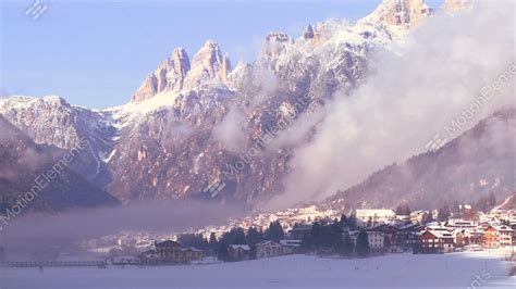 A Distant Snowbound Village In The Alps In Austria Stock video footage ...