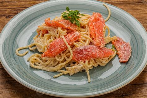 Pasta with salmon and cream cheese 7868525 Stock Photo at Vecteezy