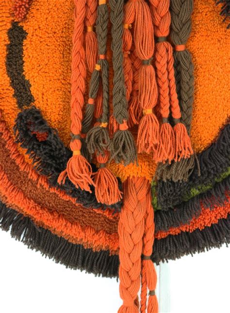 Wool wall carpet decoration in orange colors