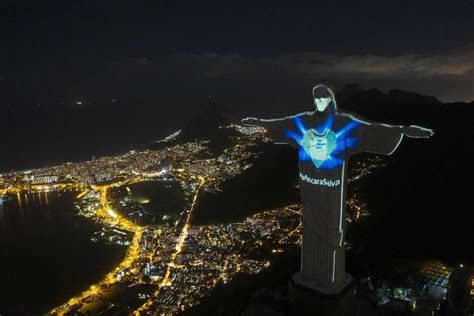 Christ the Redeemer statue wearing a protective mask in Brazil