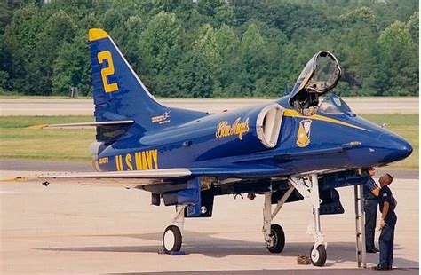 A Blue Angels Douglas A-4F Skyhawk gets a final check. | Us navy blue ...