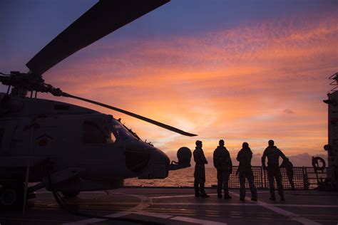 Embarked MH-60 Romeo helicopter preparing to take off onboard HMAS ...