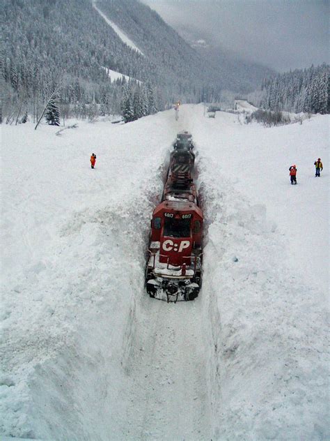 Plowing through snow in Rogers Pass, Glacier Park, B.C. | Train, Winter ...