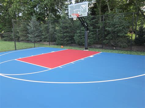 This is a royal blue and red backyard asphalt basketball court we did ...