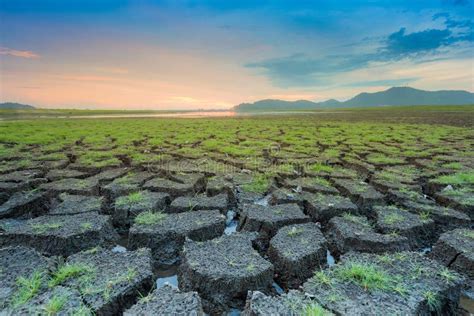 Cracked Land Background with Sunset Sky Stock Photo - Image of horizon ...