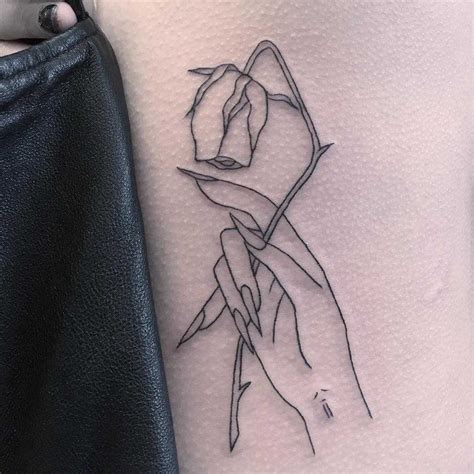 Hand with a dead rose by Jen Wong - Tattoogrid.net