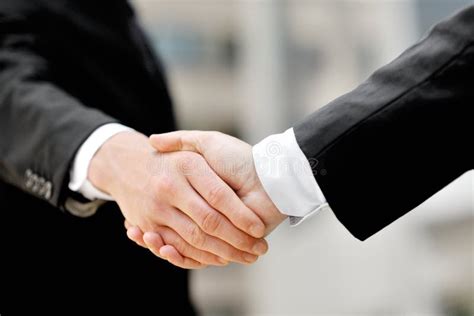 Businessmen Shaking Hands - Business Deal Partnership Concept Stock ...