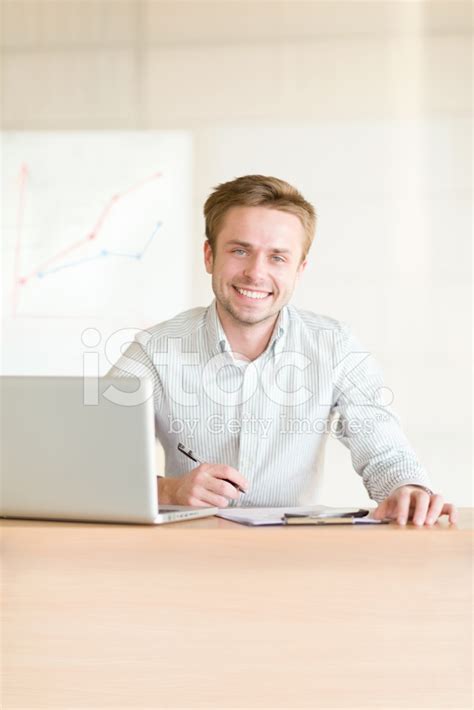 Business Man Working At Office Stock Photo | Royalty-Free | FreeImages