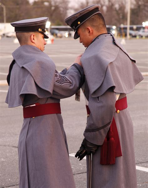 File:U.S. Army West Point cadets assist each other with their uniforms ...