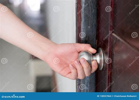 Hand is Opening the Door Knob Stock Photo - Image of hotel, handle ...