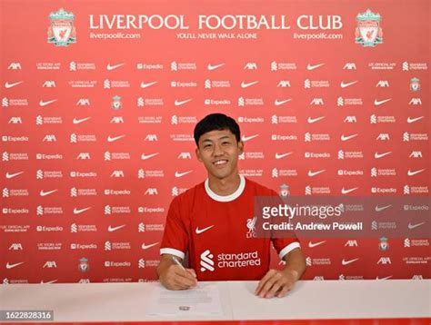 Liverpool complete signing of midfielder Wataru Endo