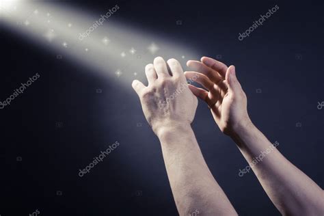 Prayer raised hands Stock Photo by ©papa42 10522612