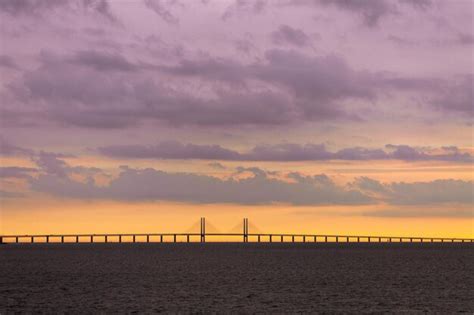 Premium Photo | Beautiful sunset over the bridge oresund