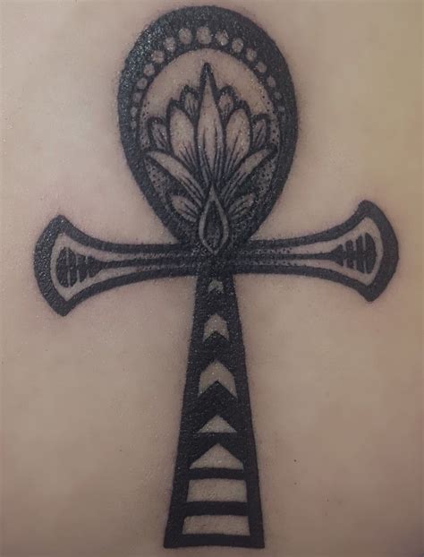 Egyptian ankh and lotus tattoo Ire Katuless at Blue Cat Tattoo in ...