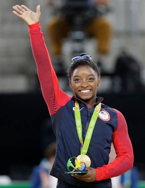 Simone Biles soars to Olympic all-around title | WJAR