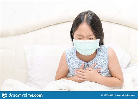 Asian Girl Wear Hygienic Mask is.coughing and Chest Pain Stock Image ...