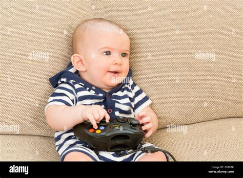 baby playing computer game Stock Photo - Alamy