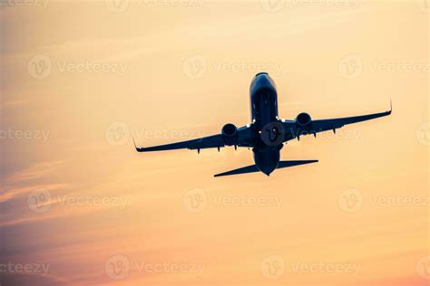 Airplane silhouette at the sunset background. 26283256 Stock Photo at ...