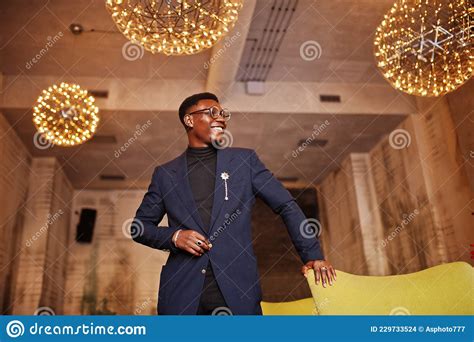 Fashionable African American Man in Suit Stock Photo - Image of interior, cafe: 229733524