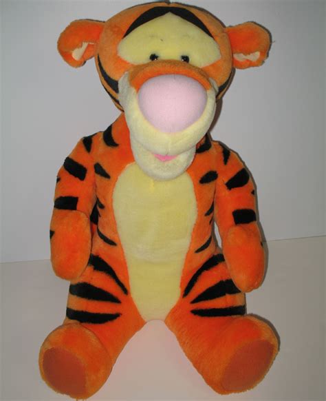 TIGGER talks and is soooo cute. Give hime a hug and he'll say, "I'm ...